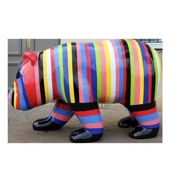 Abstract decorative sculpture designed as a bear with colorful stripes 165cm length